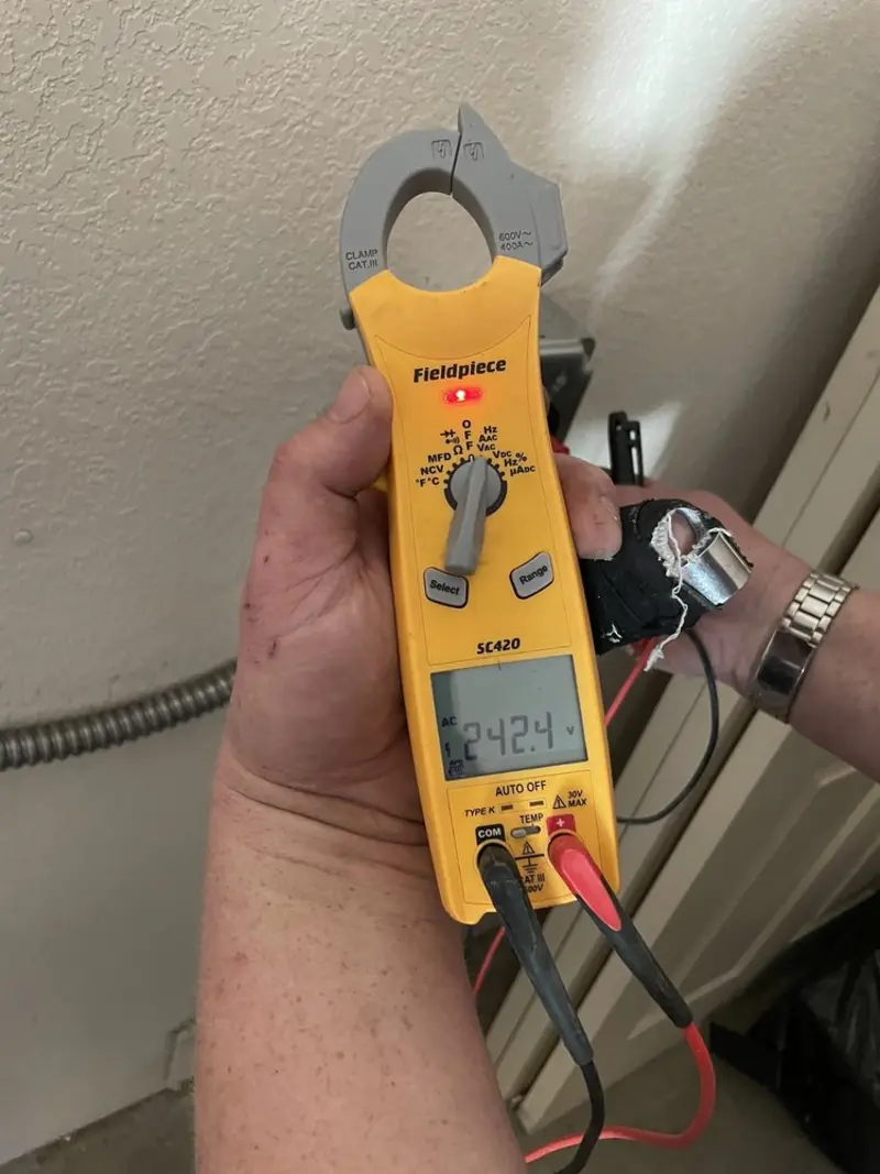 Voltage testing with clamp meter during Generator Installation in Buckhorn